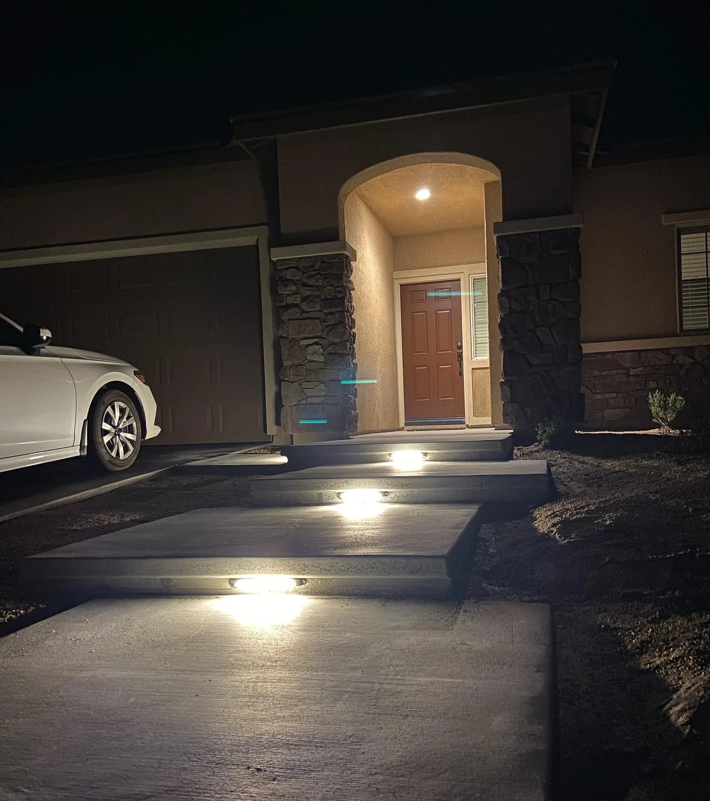 Driveway and entry lighting at night