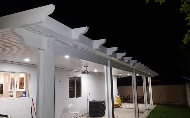 Downlights under a patio cover at night