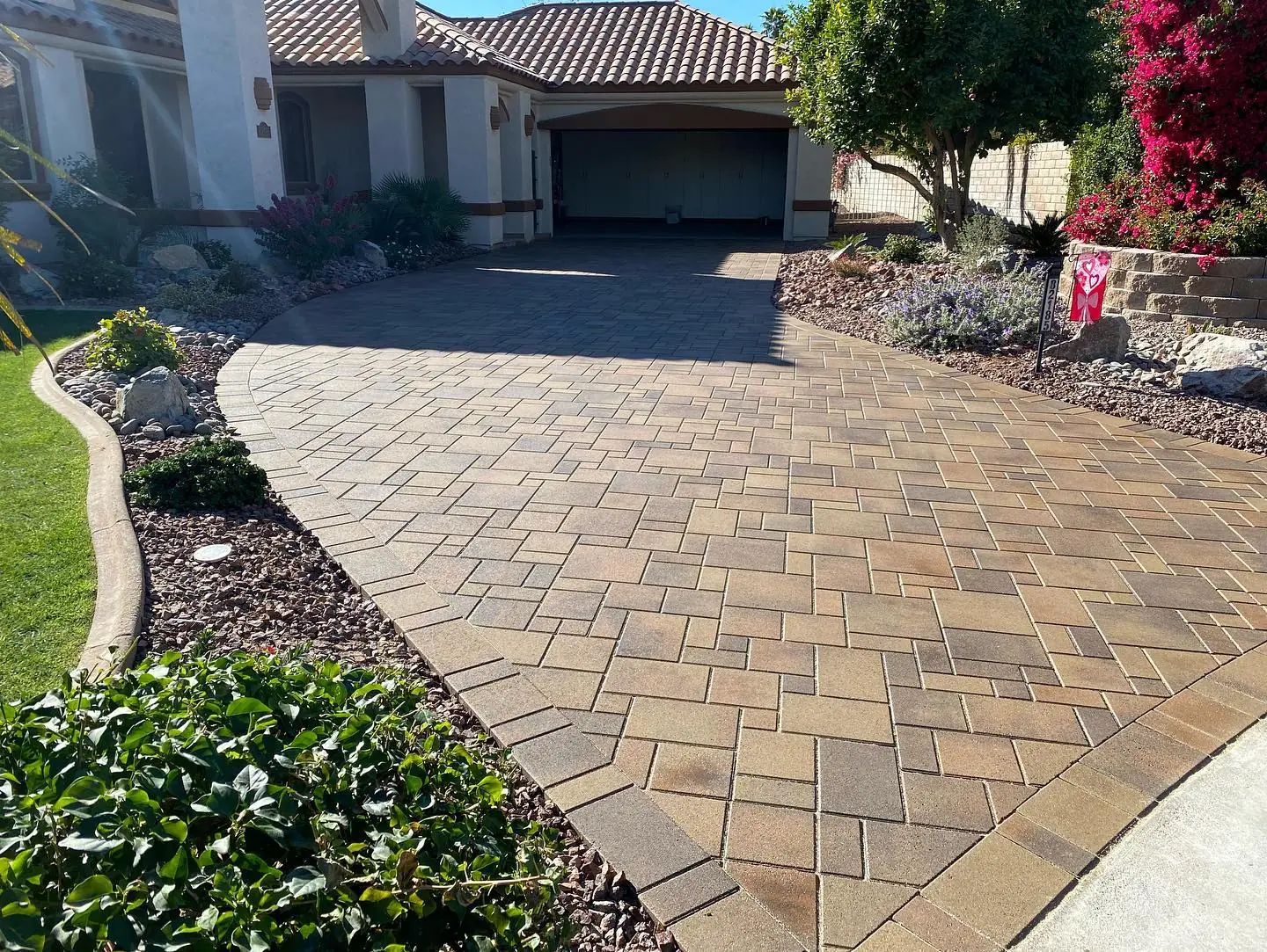 Curved paver driveway entrance