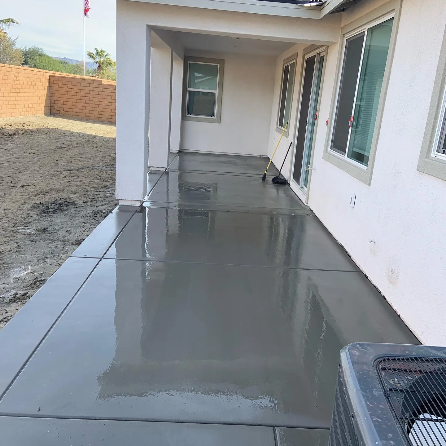 Large backyard concrete patio