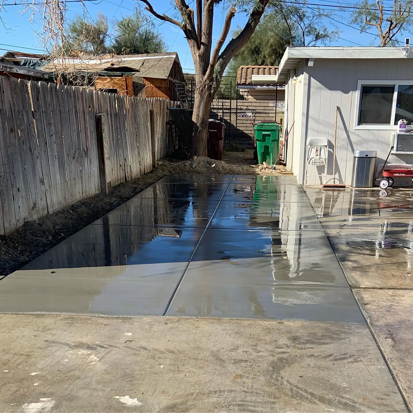 New concrete pad in a desert backyard