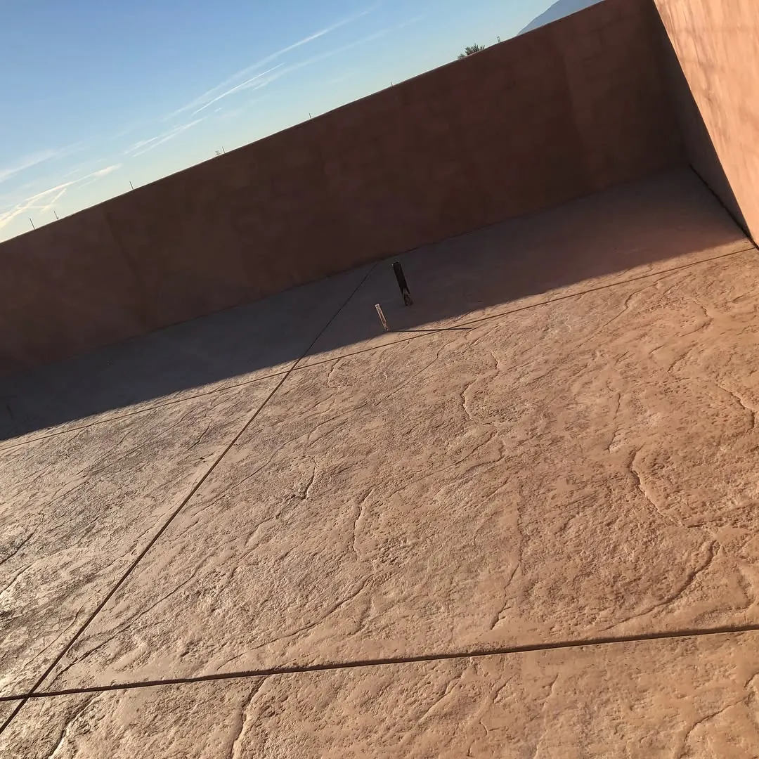 Stamped, textured concrete finish by Martinez Bros