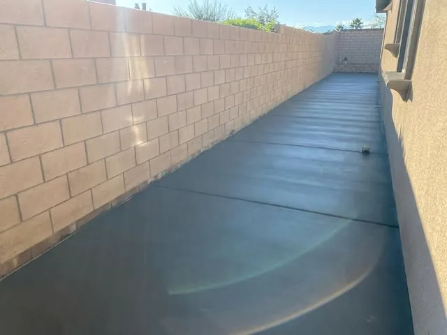 Long concrete side-yard walkway