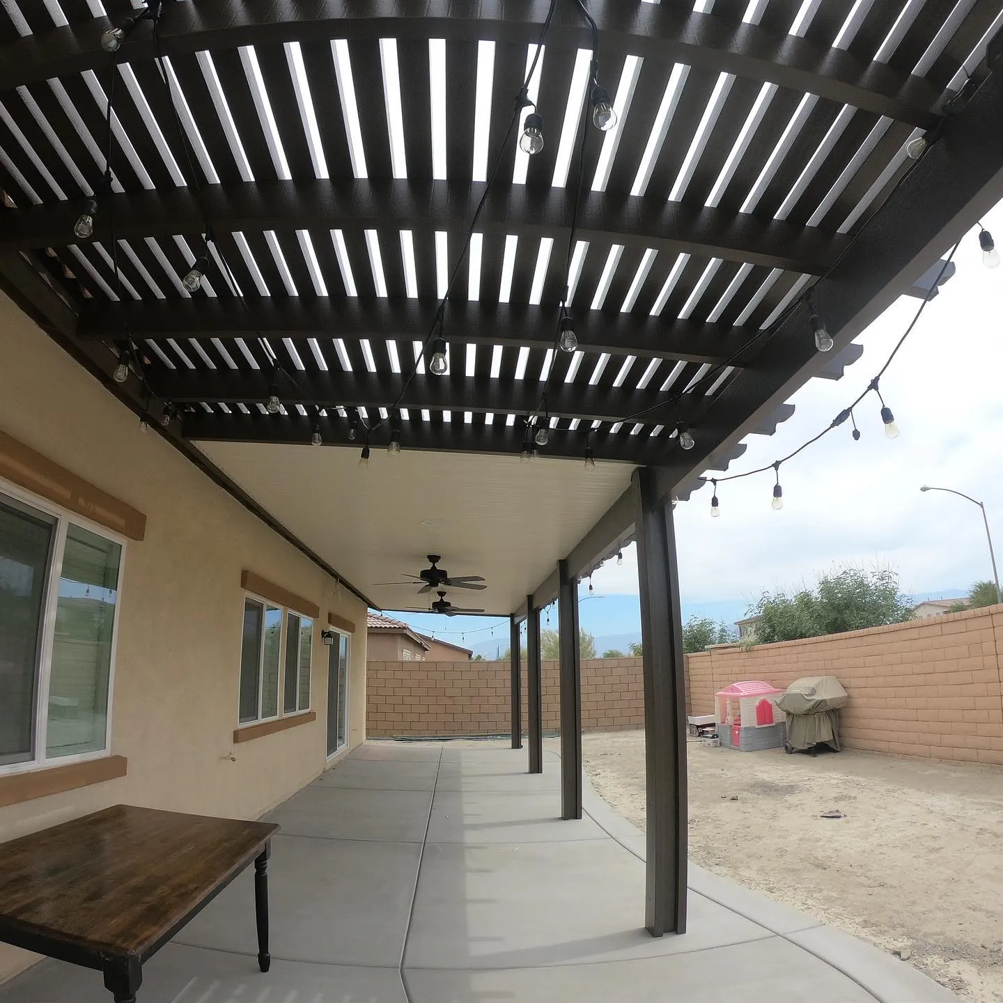 String lights across a covered patio